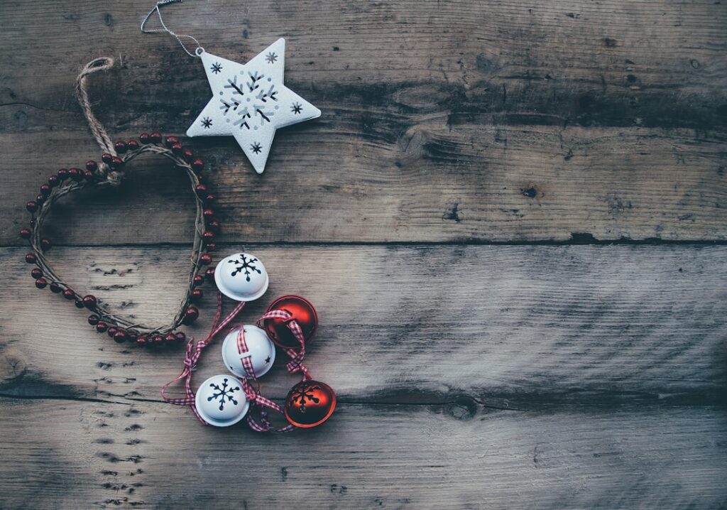 Christmas decorations on wooden table.